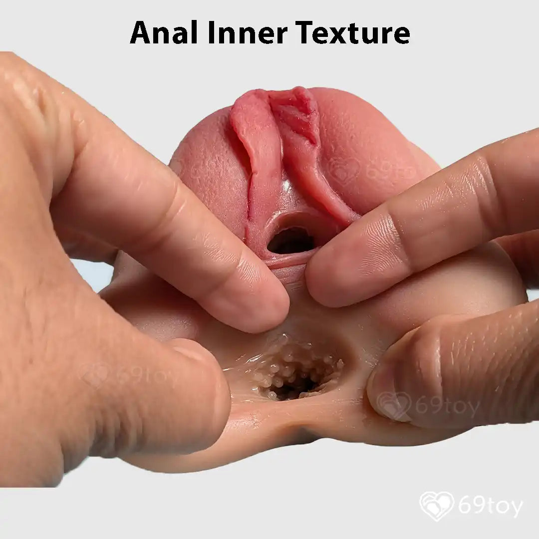 Close-up of a hand holding an female anal inner texture with '69toy' branding.