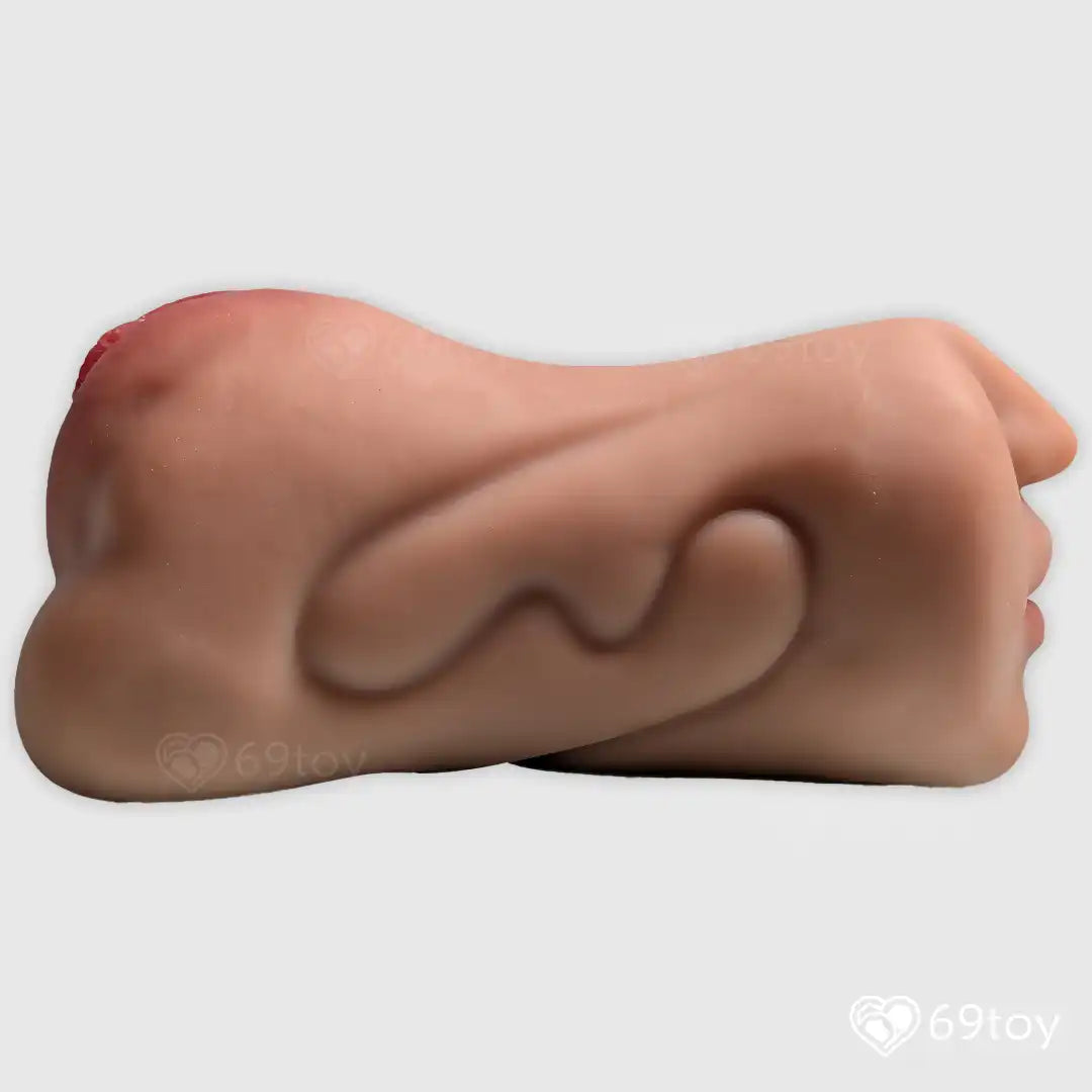 Realistic silicone Masturbator on a white background with '69toy' branding.